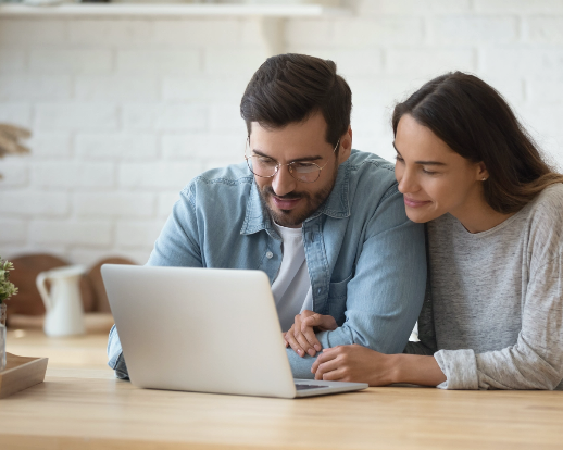 Couple looking at laptop