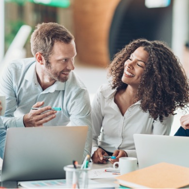 Man and women at a meeting